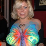 Drunk girls getting body painted